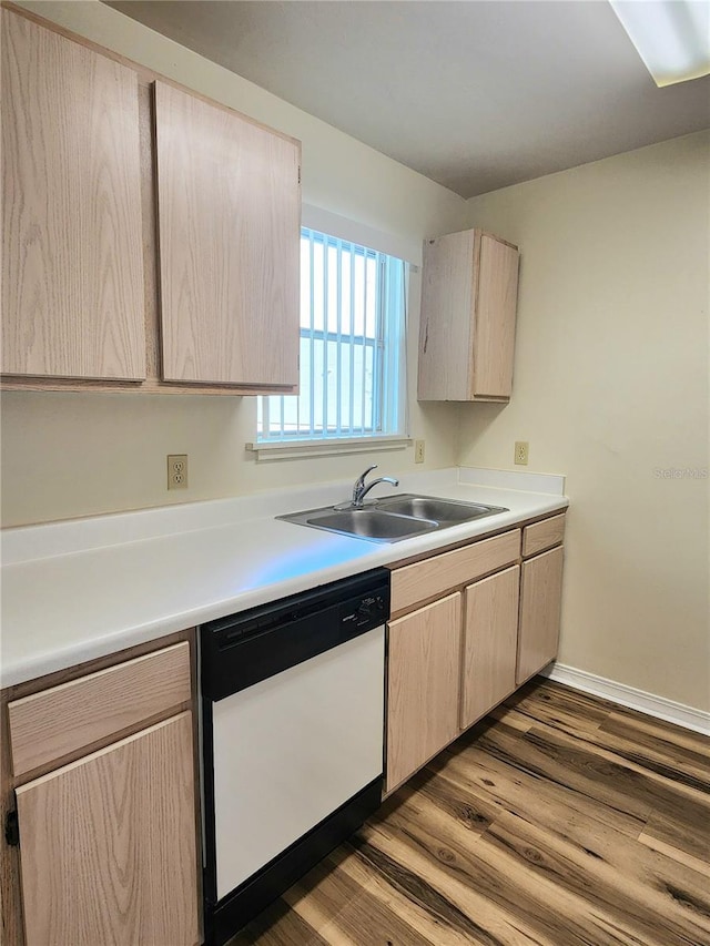 2360 SW Archer Rd Unit 208, Gainesville, FL 32608 - kitchen with dishwasher, light brown cabinetry, and wood finished floors