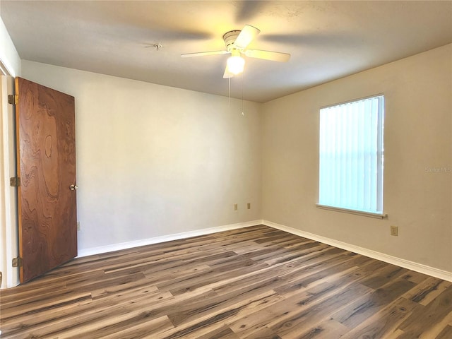 2360 SW Archer Rd Unit 208, Gainesville, FL 32608 - spare room featuring wood finished floors and a ceiling fan