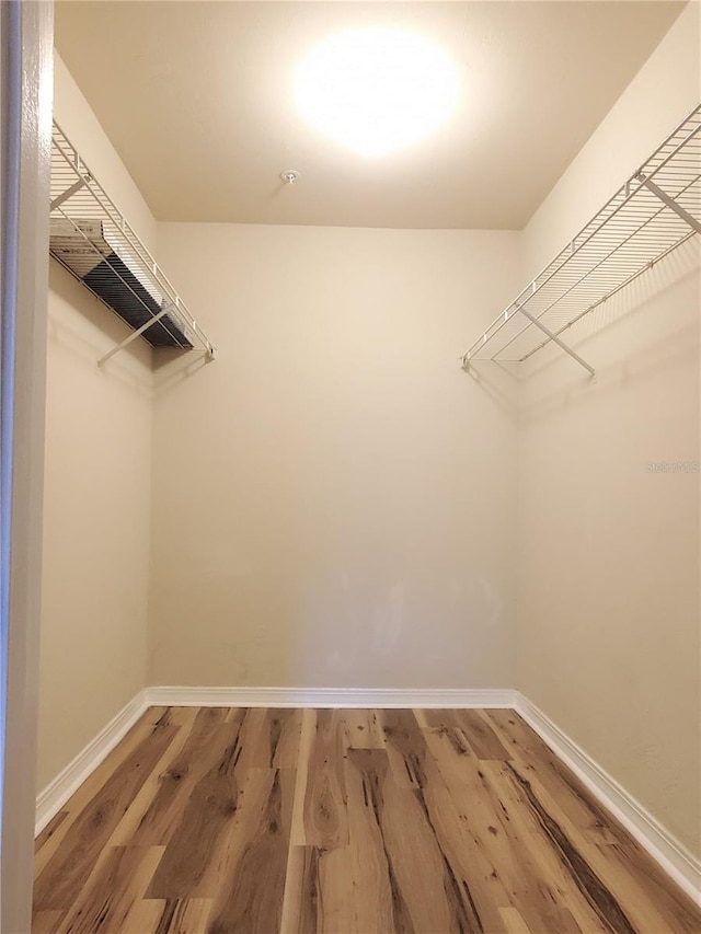 2360 SW Archer Rd Unit 208, Gainesville, FL 32608 - spacious closet with wood finished floors