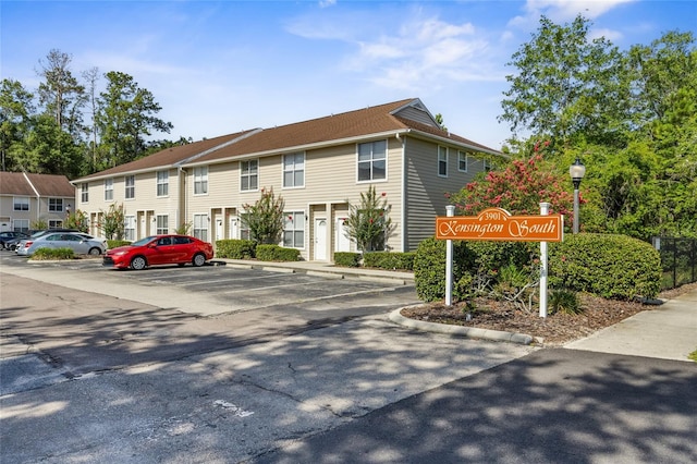 3901 SW 20th Ave Unit 806, Gainesville, FL 32607 - view of building exterior with uncovered parking