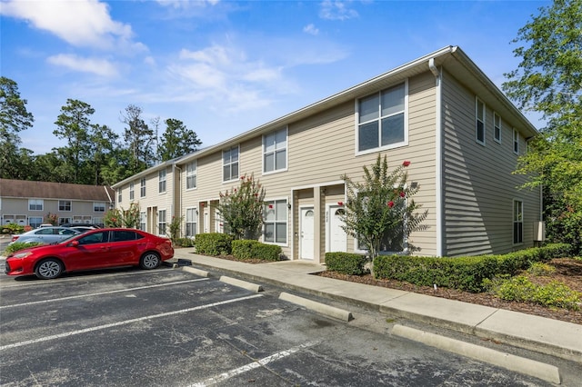 3901 SW 20th Ave Unit 806, Gainesville, FL 32607 - view of building exterior featuring uncovered parking