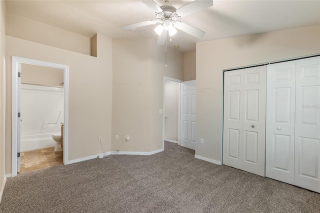 3901 SW 20th Ave Unit 806, Gainesville, FL 32607 - unfurnished bedroom featuring carpet floors, ensuite bathroom, a closet, and a ceiling fan