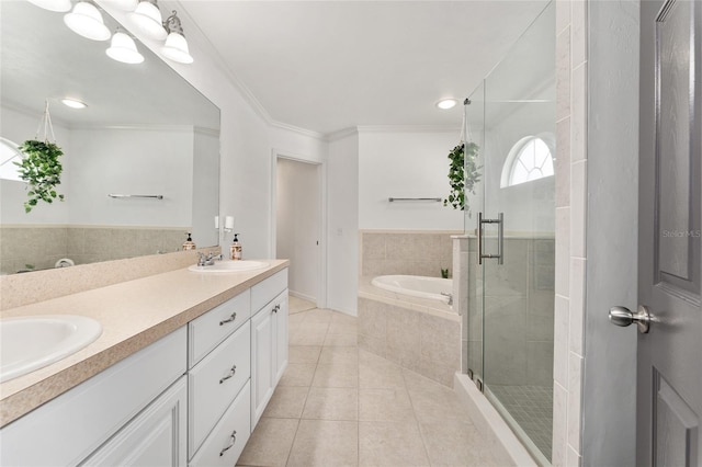 11752 NW 61st Ter, Alachua, FL 32615 - full bathroom with tile patterned flooring, a bath, double vanity, a shower stall, and ornamental molding
