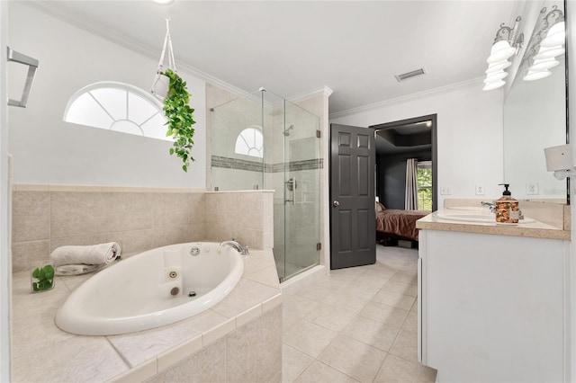 11752 NW 61st Ter, Alachua, FL 32615 - bathroom featuring a jetted tub, a shower stall, vanity, ornamental molding, and tile patterned flooring