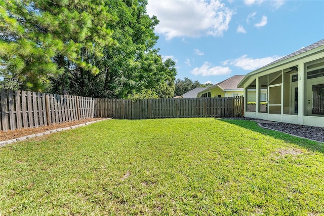 11752 NW 61st Ter, Alachua, FL 32615 - fenced backyard featuring a sunroom