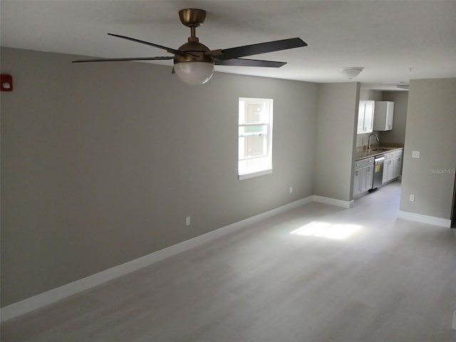 6519 W Newberry Rd Unit 404, Gainesville, FL 32605 - unfurnished room featuring a ceiling fan and light wood finished floors