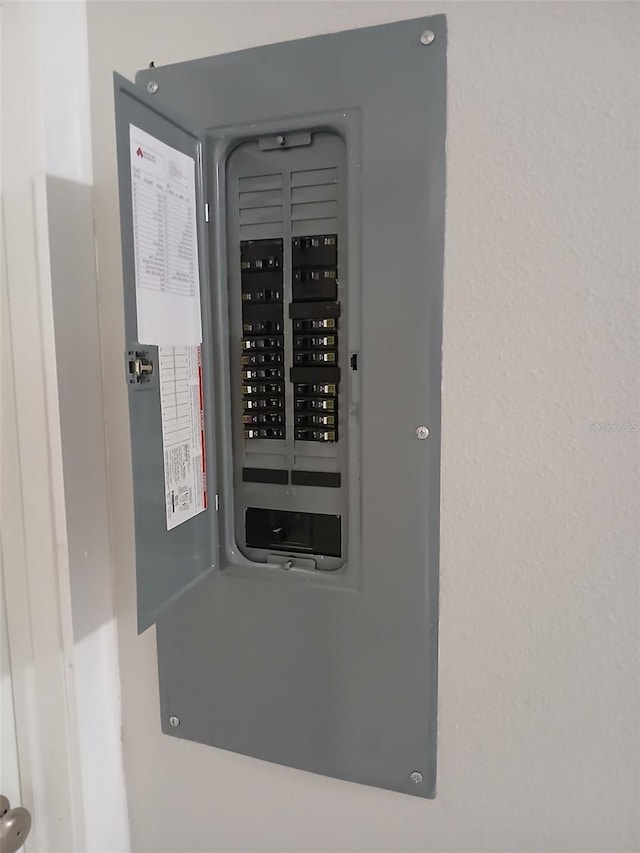 6519 W Newberry Rd Unit 404, Gainesville, FL 32605 - utility room featuring electric panel