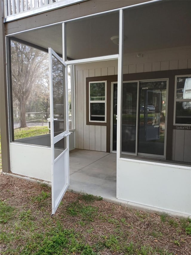 6519 W Newberry Rd Unit 404, Gainesville, FL 32605 - view of unfurnished sunroom
