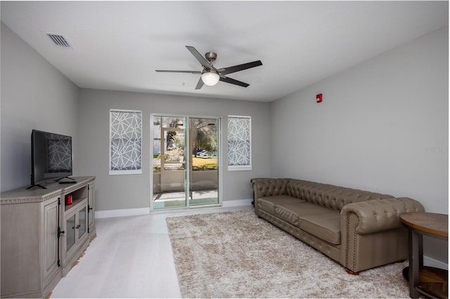 6519 W Newberry Rd Unit 404, Gainesville, FL 32605 - living room featuring ceiling fan and light wood-type flooring