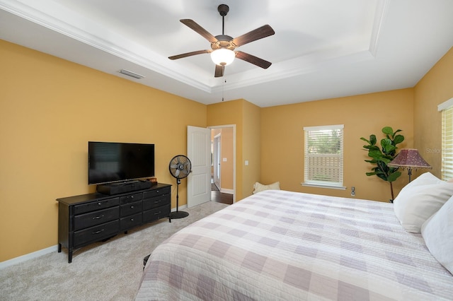 7827 SW 79th Dr, Gainesville, FL 32608 - carpeted bedroom with a raised ceiling and a ceiling fan