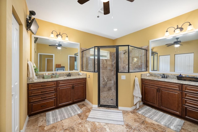 7827 SW 79th Dr, Gainesville, FL 32608 - full bathroom featuring ceiling fan, a shower stall, and two vanities