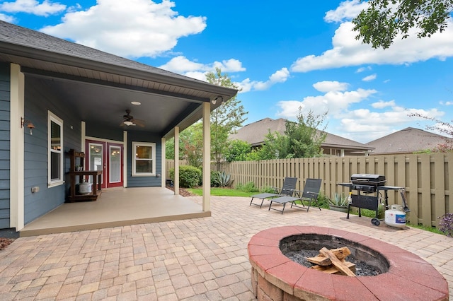7827 SW 79th Dr, Gainesville, FL 32608 - view of patio / terrace with grilling area, an outdoor fire pit, and ceiling fan