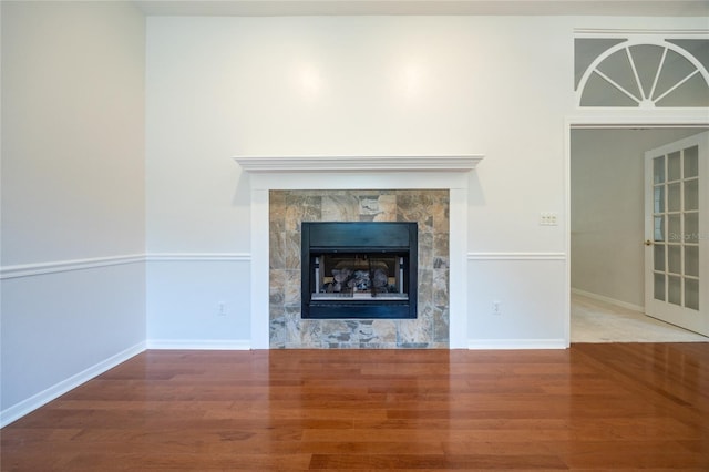 2013 SW 76th Ter, Gainesville, FL 32607 - detailed view of wood finished floors and a fireplace