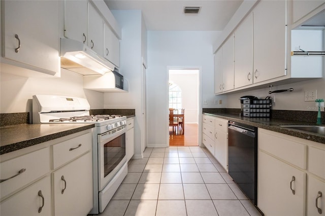 2013 SW 76th Ter, Gainesville, FL 32607 - kitchen with white gas stove, dishwasher, ventilation hood, dark countertops, and light tile patterned flooring