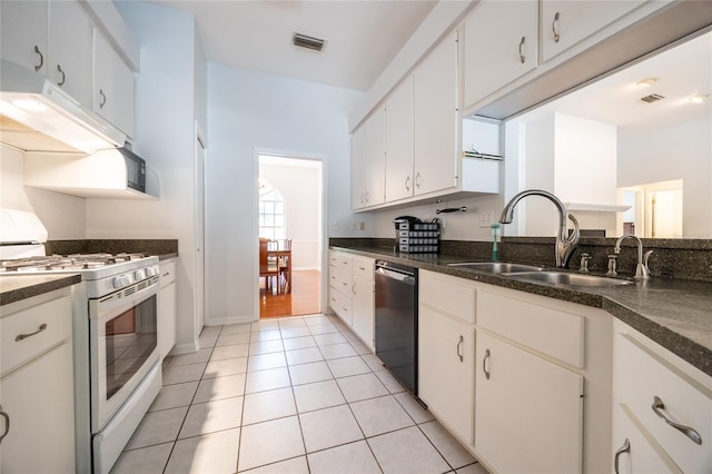 2013 SW 76th Ter, Gainesville, FL 32607 - kitchen with white gas stove, dishwashing machine, extractor fan, light tile patterned flooring, and white cabinets