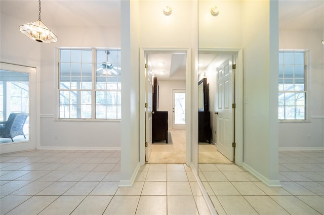 2013 SW 76th Ter, Gainesville, FL 32607 - foyer featuring light tile patterned flooring and ceiling fan