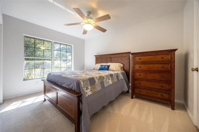 2013 SW 76th Ter, Gainesville, FL 32607 - bedroom with light carpet and ceiling fan