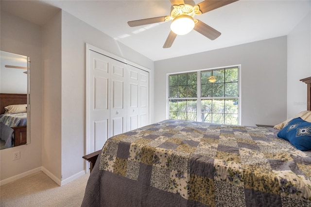 2013 SW 76th Ter, Gainesville, FL 32607 - bedroom with light colored carpet, a closet, and ceiling fan