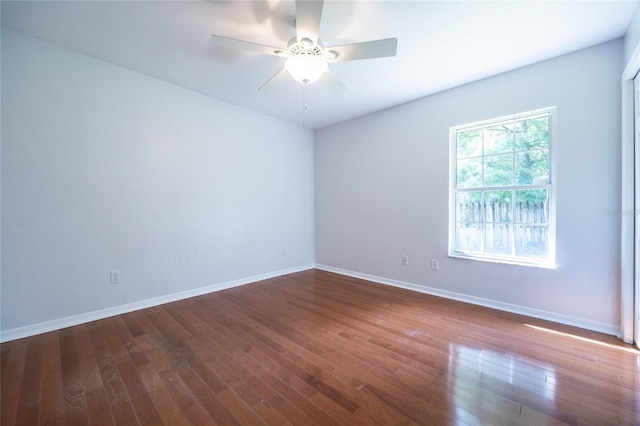 2013 SW 76th Ter, Gainesville, FL 32607 - unfurnished room with dark wood-style flooring and ceiling fan