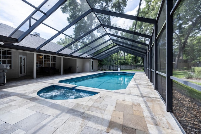 2013 SW 76th Ter, Gainesville, FL 32607 - view of swimming pool featuring a patio, a pool with connected hot tub, a lanai, and french doors