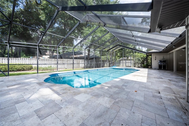 2013 SW 76th Ter, Gainesville, FL 32607 - view of pool featuring a patio area, a fenced backyard, and glass enclosure