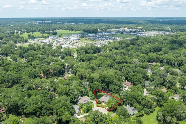 2013 SW 76th Ter, Gainesville, FL 32607 - aerial view of property's location with property parcel outlined and a heavily wooded area