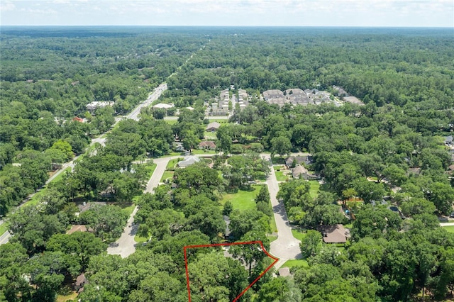 2013 SW 76th Ter, Gainesville, FL 32607 - aerial overview of property's location with a heavily wooded area and property boundaries highlighted