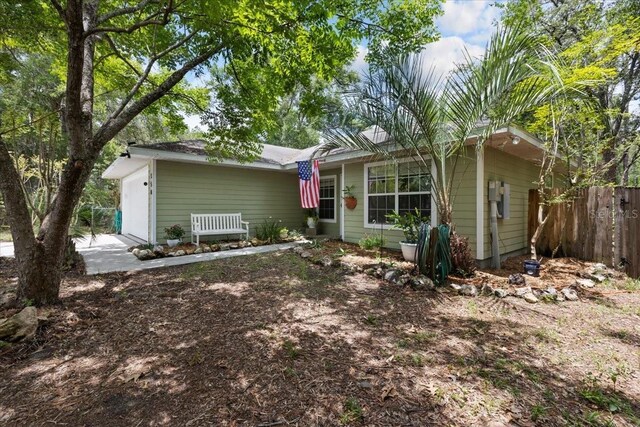 350 Hardee St, Bronson, FL 32621 - view of front of property with a garage