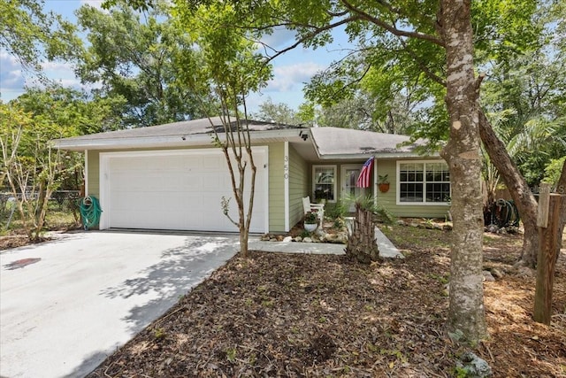 350 Hardee St, Bronson, FL 32621 - view of front of house with an attached garage and driveway