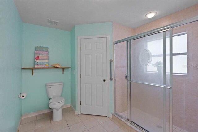350 Hardee St, Bronson, FL 32621 - bathroom with a shower stall and tile patterned flooring