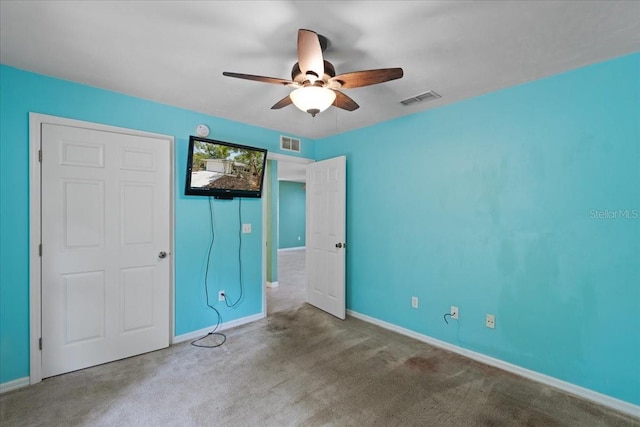 350 Hardee St, Bronson, FL 32621 - unfurnished bedroom featuring carpet and ceiling fan
