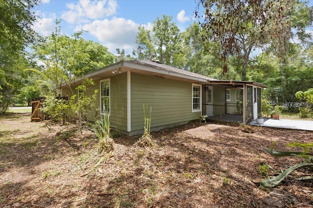 350 Hardee St, Bronson, FL 32621 - view of home's exterior featuring a patio area