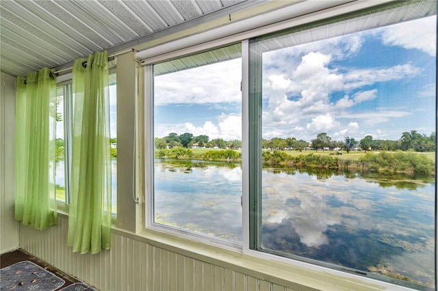 487 Midway Dr Unit B, Ocala, FL 34472 - unfurnished sunroom featuring a water view