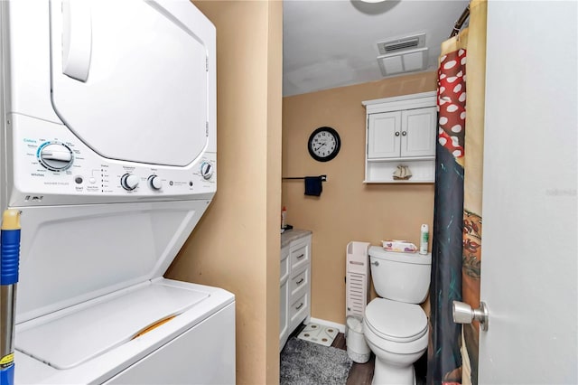 487 Midway Dr Unit B, Ocala, FL 34472 - laundry room featuring stacked washer / dryer