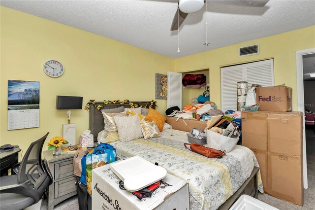487 Midway Dr Unit B, Ocala, FL 34472 - bedroom featuring carpet floors, a ceiling fan, and a textured ceiling