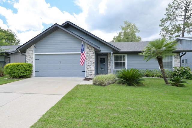 3735 NW 64th Pl, Gainesville, FL 32653 - ranch-style home featuring stone siding, a garage, a front yard, driveway, and roof with shingles