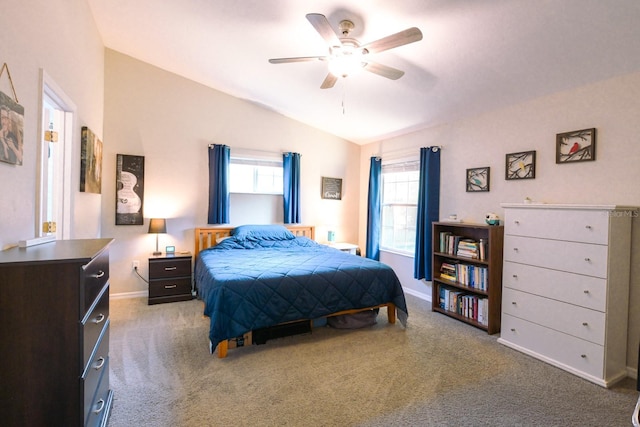 3735 NW 64th Pl, Gainesville, FL 32653 - carpeted bedroom with lofted ceiling, multiple windows, and ceiling fan