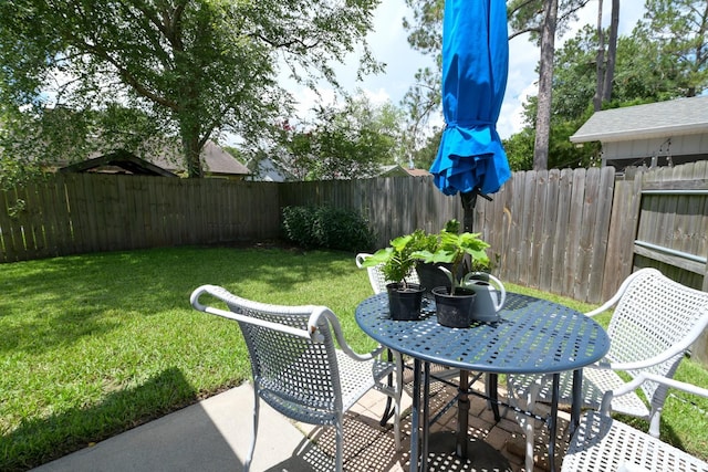 3735 NW 64th Pl, Gainesville, FL 32653 - fenced backyard featuring a patio