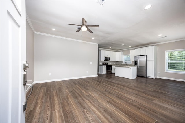 16011 S County Road 325, Hawthorne, FL 32640 - unfurnished living room featuring ornamental molding, a ceiling fan, recessed lighting, and dark wood-style flooring