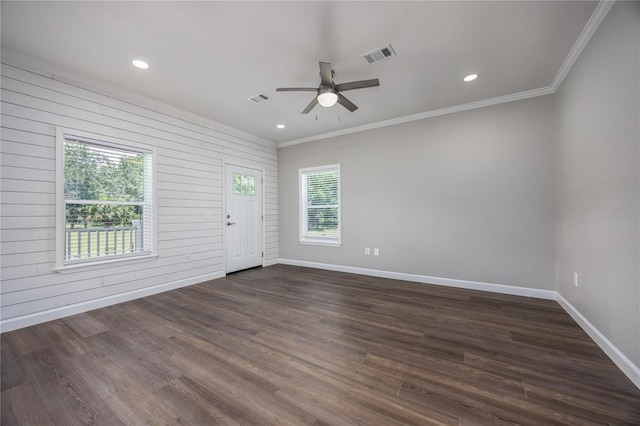 16011 S County Road 325, Hawthorne, FL 32640 - spare room featuring crown molding, a ceiling fan, dark wood-style flooring, recessed lighting, and wood walls