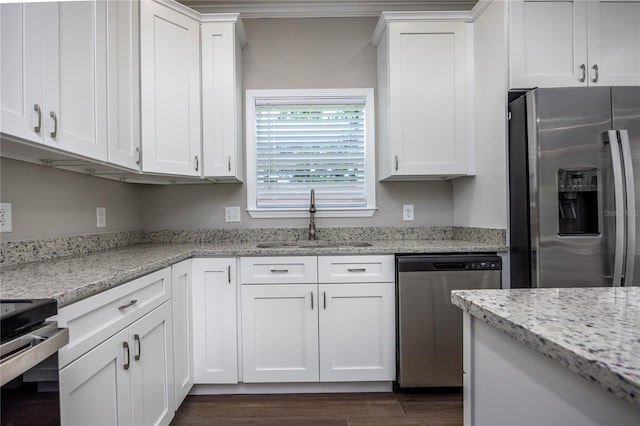 16011 S County Road 325, Hawthorne, FL 32640 - kitchen featuring stainless steel appliances, white cabinets, dark wood-style flooring, and light stone counters