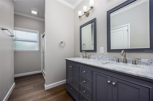 16011 S County Road 325, Hawthorne, FL 32640 - full bathroom with double vanity, crown molding, wood finished floors, and a shower with door