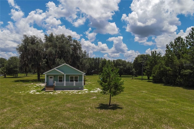 16011 S County Road 325, Hawthorne, FL 32640 - view of green lawn with a porch