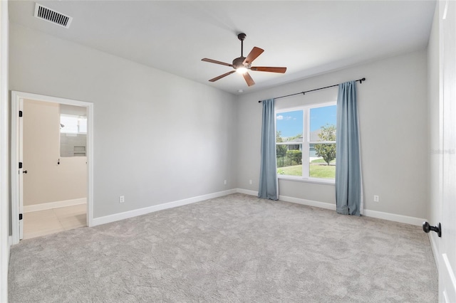 2556 SW 118th Ter, Gainesville, FL 32608 - carpeted empty room with a ceiling fan and baseboards