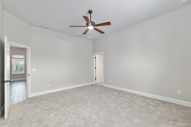 2556 SW 118th Ter, Gainesville, FL 32608 - carpeted spare room featuring a ceiling fan and baseboards
