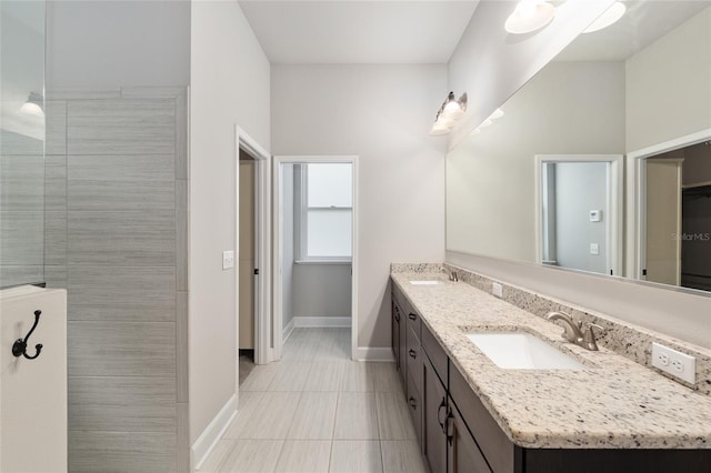 2556 SW 118th Ter, Gainesville, FL 32608 - full bathroom featuring double vanity and tile patterned flooring