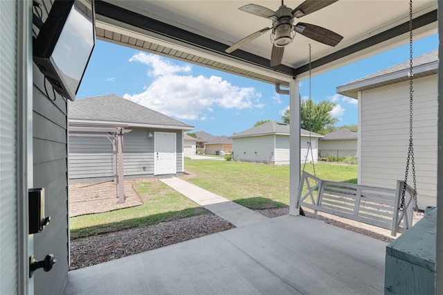 2556 SW 118th Ter, Gainesville, FL 32608 - view of patio featuring a ceiling fan and a residential view