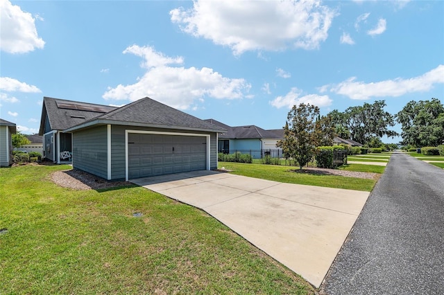 2556 SW 118th Ter, Gainesville, FL 32608 - ranch-style home featuring an attached garage, driveway, and roof with shingles