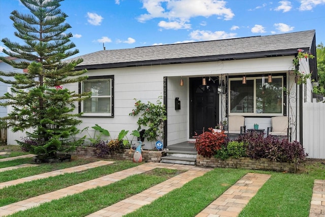 4444 5th Ave S, Saint Petersburg, FL 33711 - bungalow-style house featuring roof with shingles