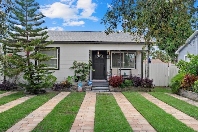 4444 5th Ave S, Saint Petersburg, FL 33711 - bungalow-style home featuring roof with shingles